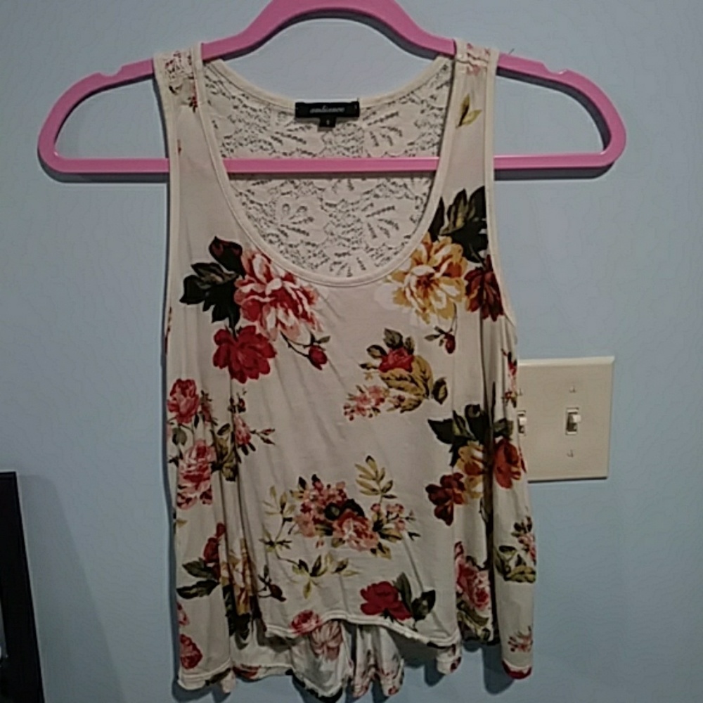 Floral top with slit in the back